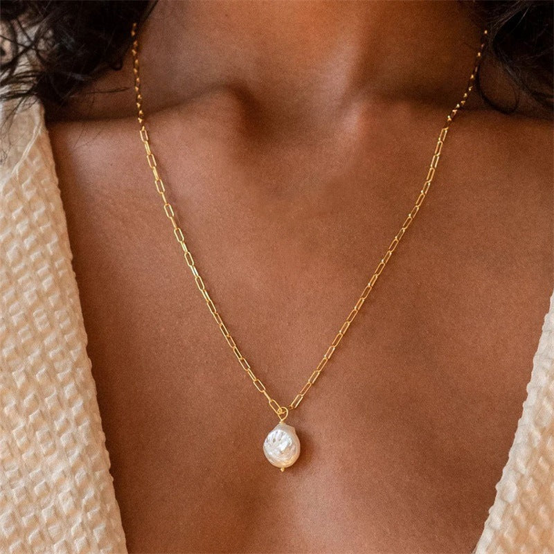 Elisa – Elegant Gold-Plated Necklace Featuring a Mini Cross