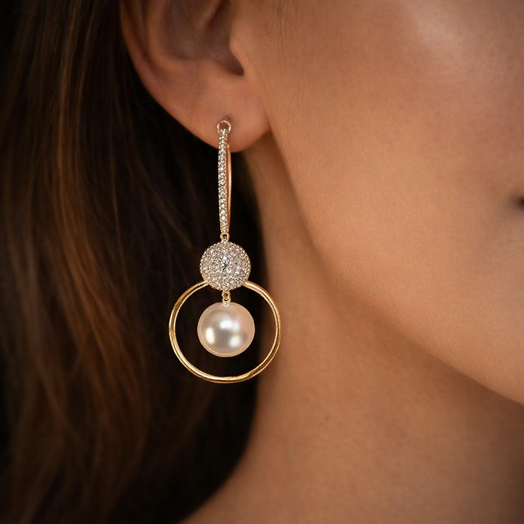Charlotte – Gold Earrings Featuring Clear Drop Design