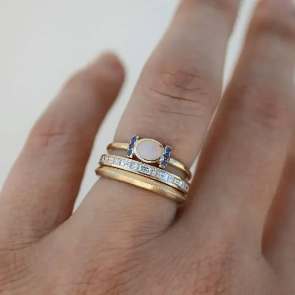 Theresa – Elegant Gold Ring Featuring a Dazzling Opal and Sleek Design