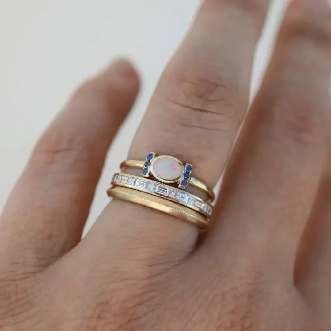 Theresa – Elegant Gold Ring Featuring a Dazzling Opal and Sleek Design