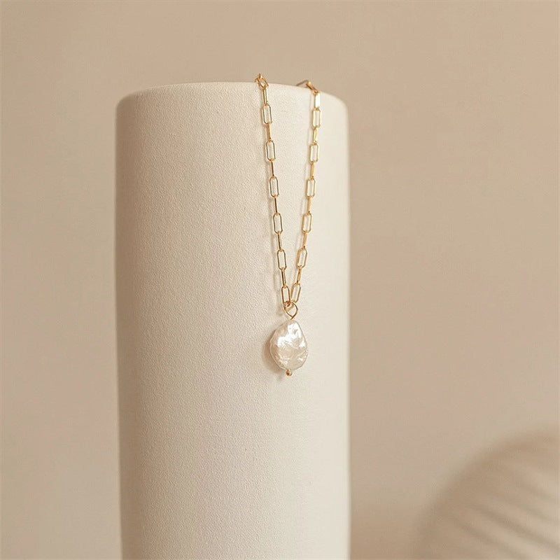Elisa – Elegant Gold-Plated Necklace Featuring a Mini Cross