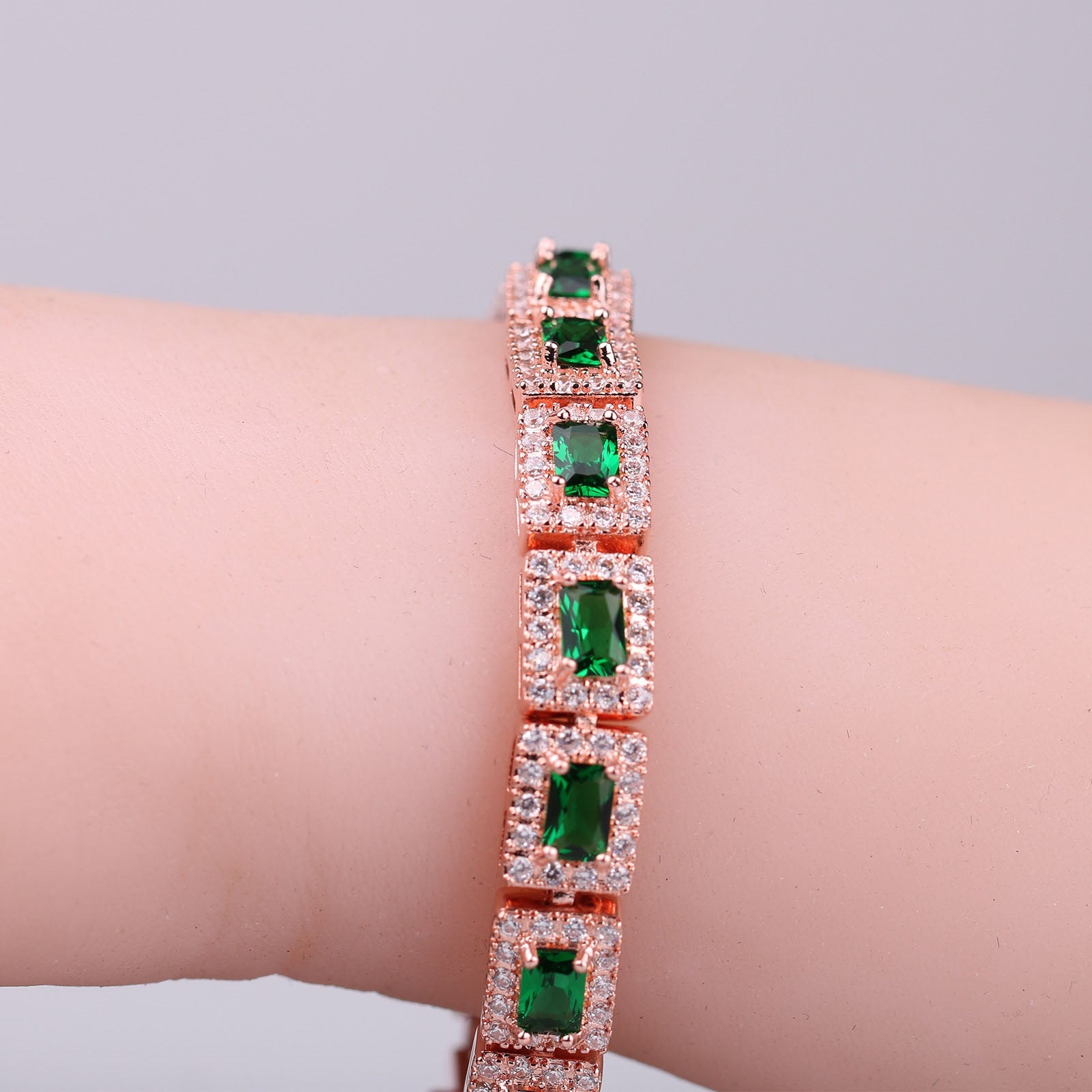 Bold Gold Bracelet with Emerald Green Accents