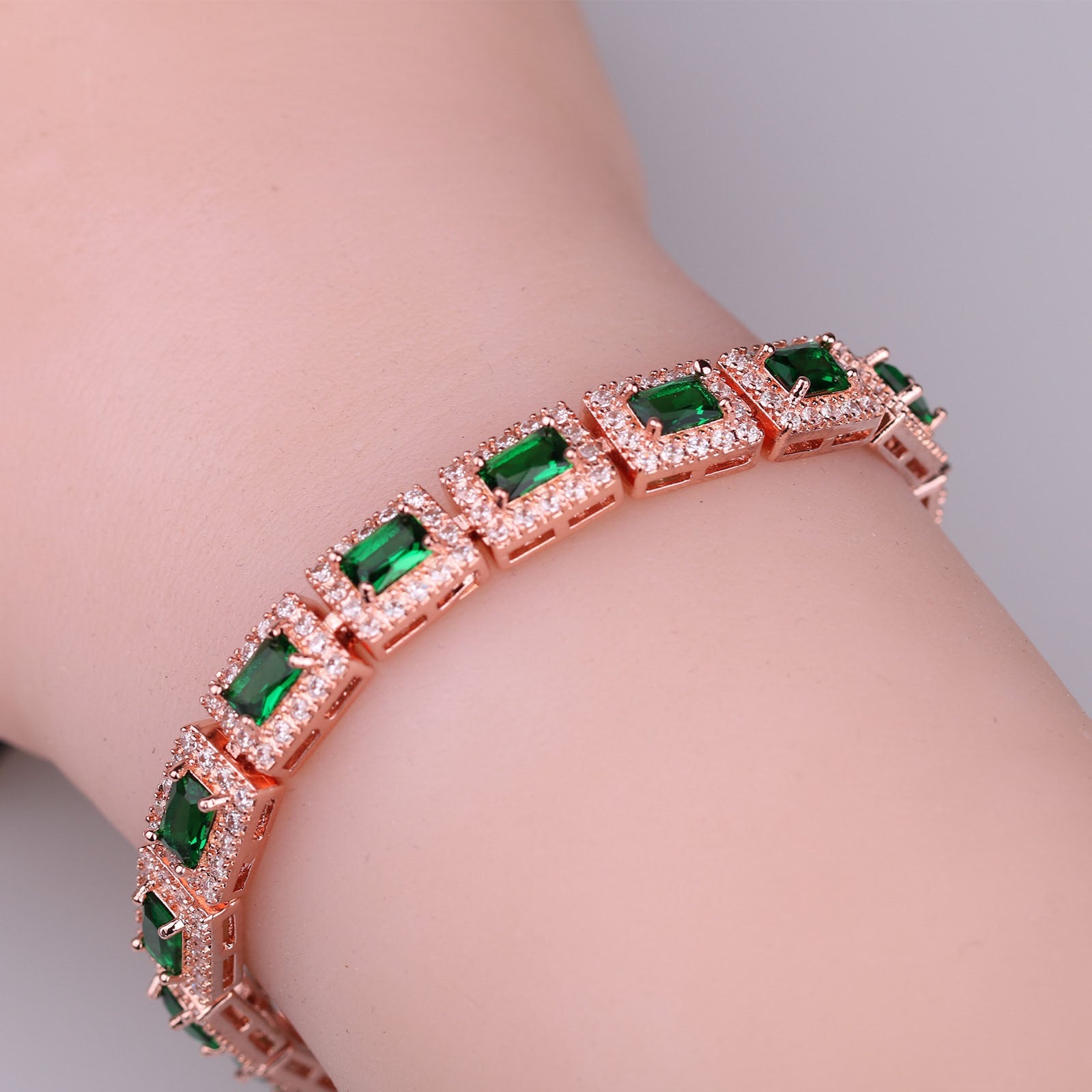 Bold Gold Bracelet with Emerald Green Accents