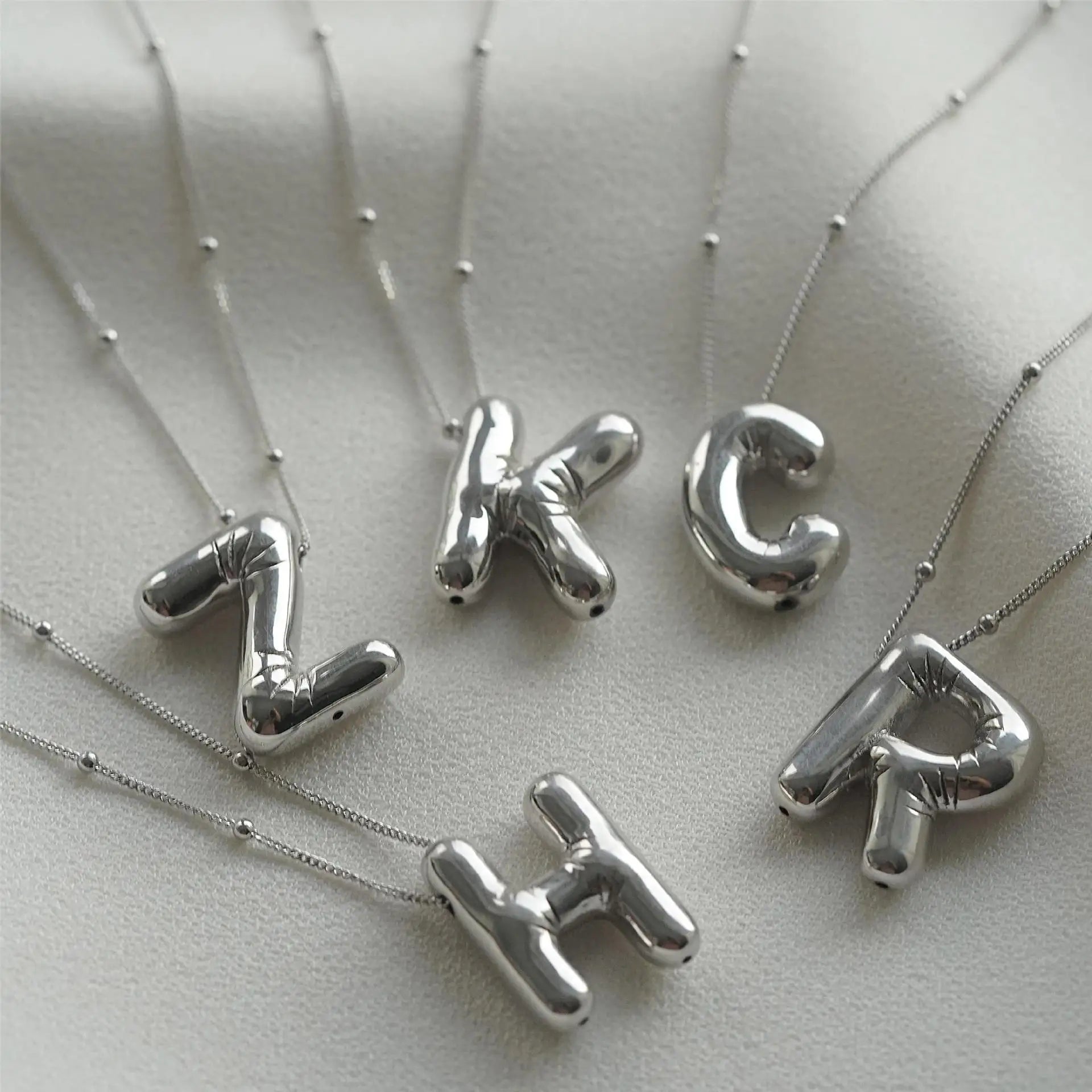 Irena – Gold Initial Charm Necklace