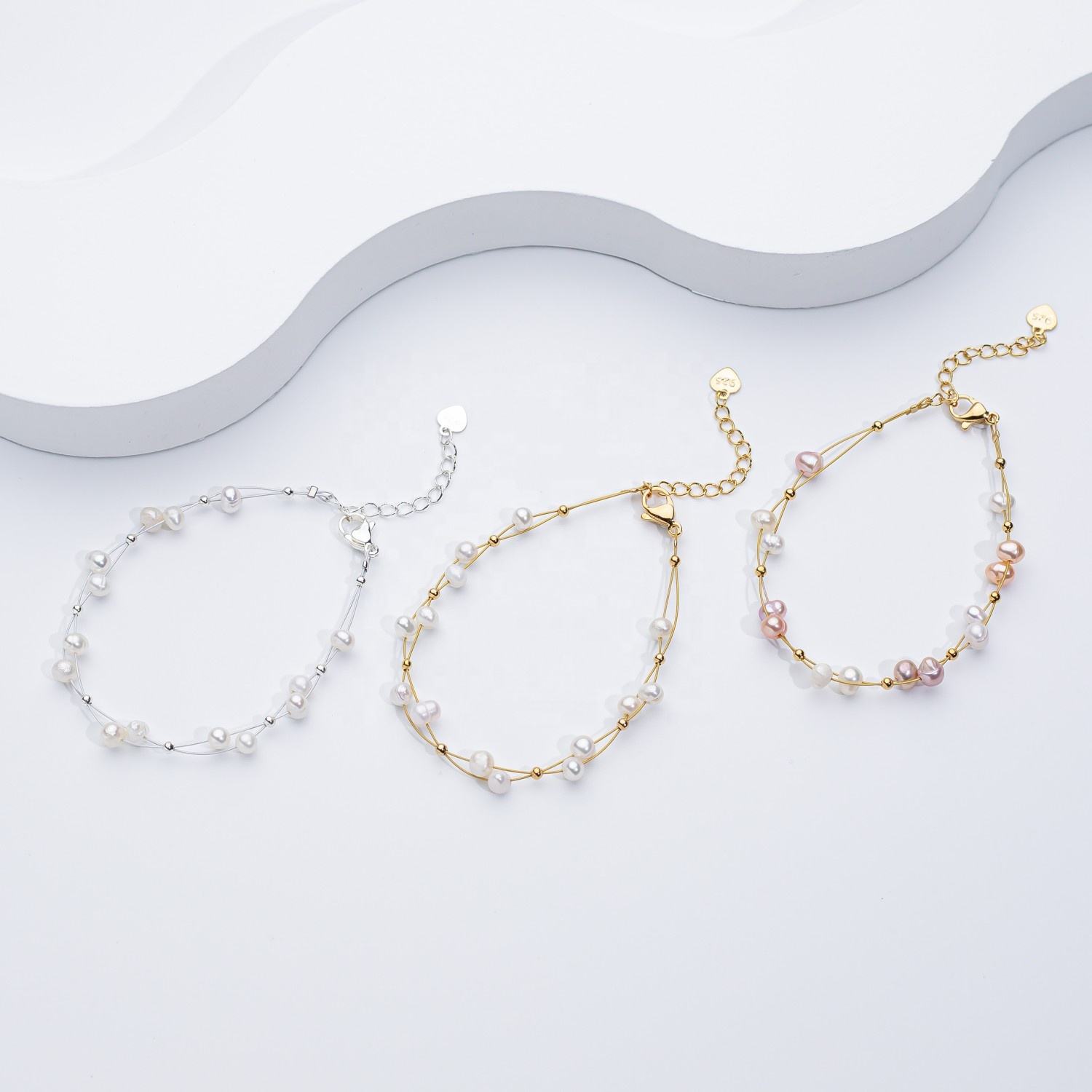 Marlene – Elegant Gold Bracelet Featuring Single Pearl Accents