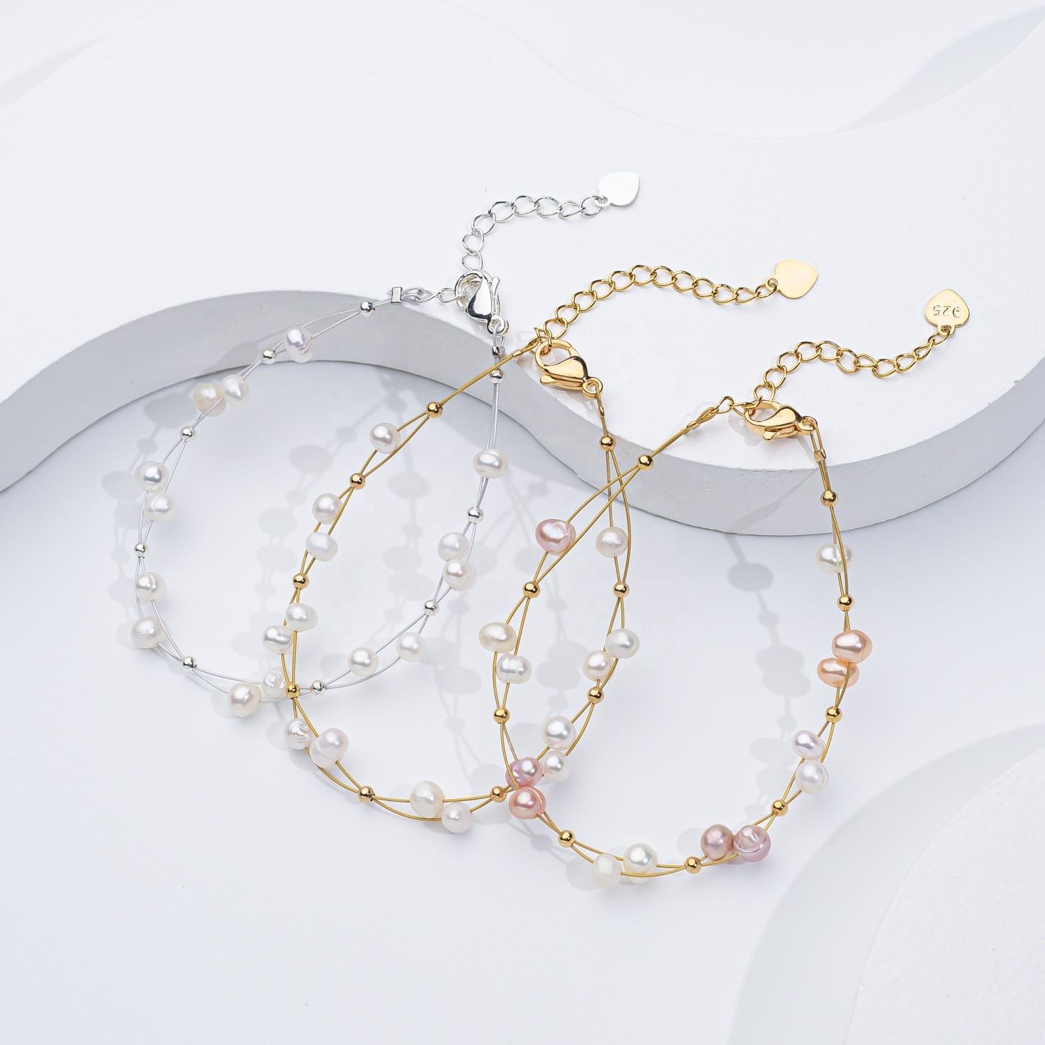 Marlene – Elegant Gold Bracelet Featuring Single Pearl Accents