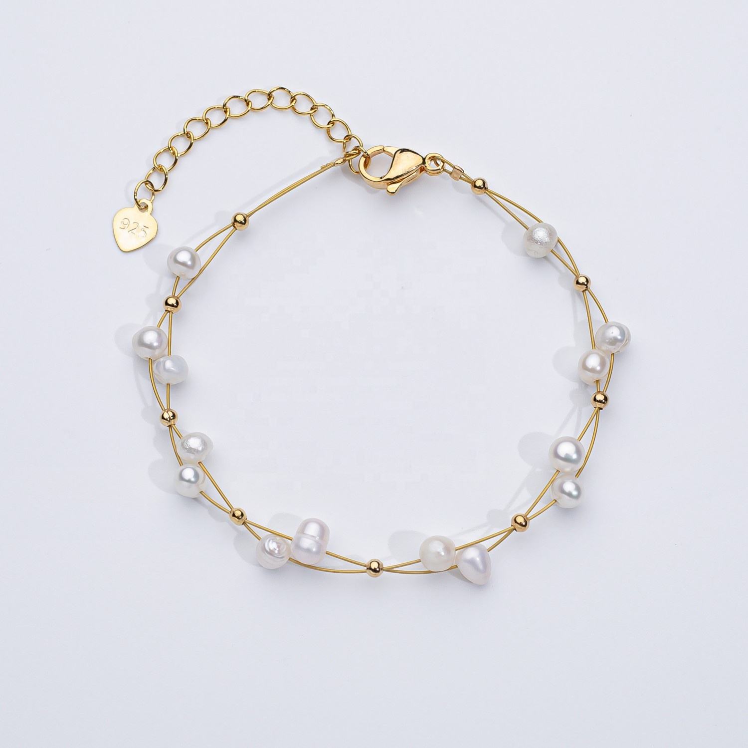 Marlene – Elegant Gold Bracelet Featuring Single Pearl Accents