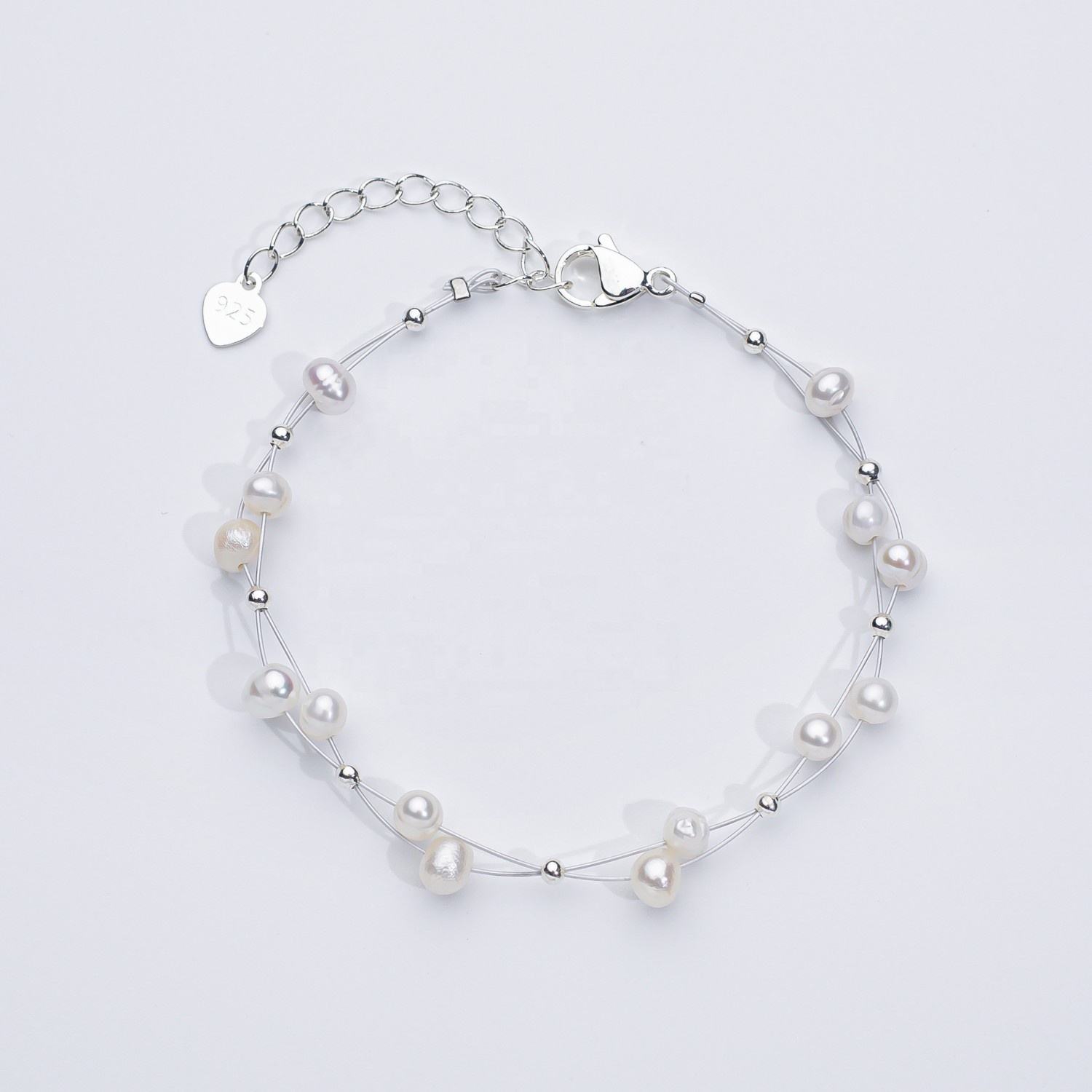 Marlene – Elegant Gold Bracelet Featuring Single Pearl Accents