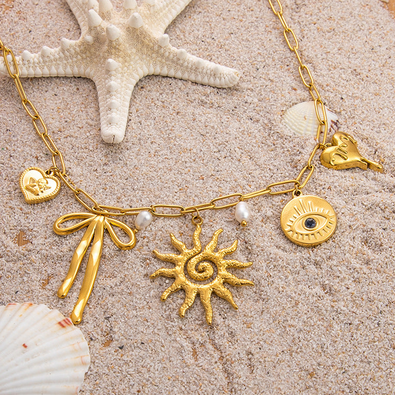 Emilie – Elegant Gold Necklace with Petite Pendants
