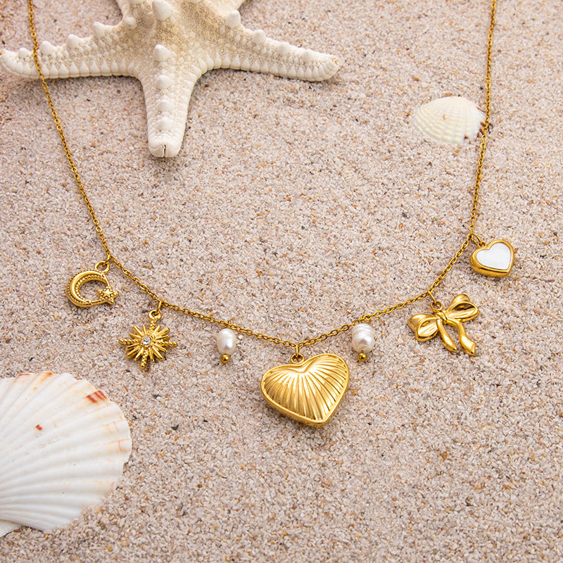 Emilie – Elegant Gold Necklace with Petite Pendants