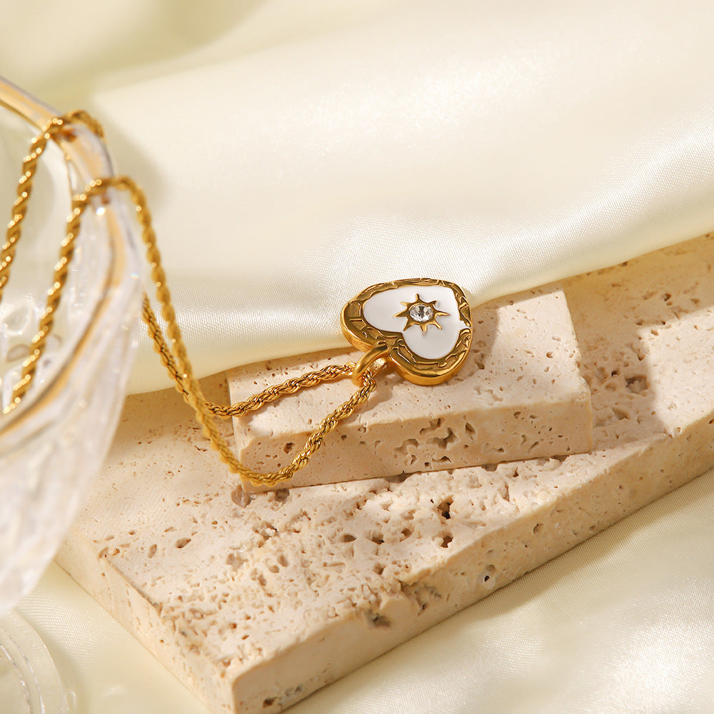 Elisabeth – Gold Necklace Featuring Delicate Symbolic Pendants