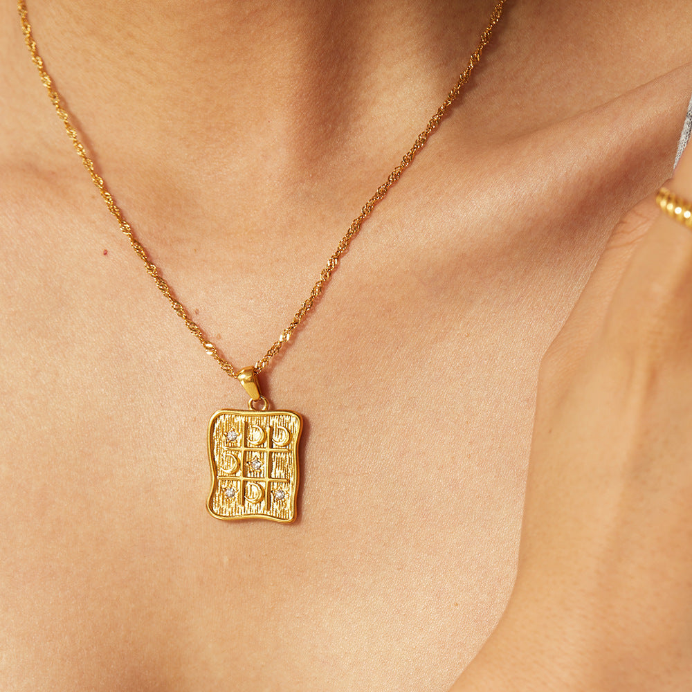 Elisabeth – Gold Necklace Featuring Delicate Symbolic Pendants