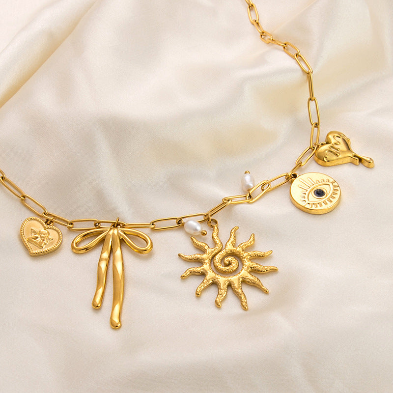 Emilie – Elegant Gold Necklace with Petite Pendants
