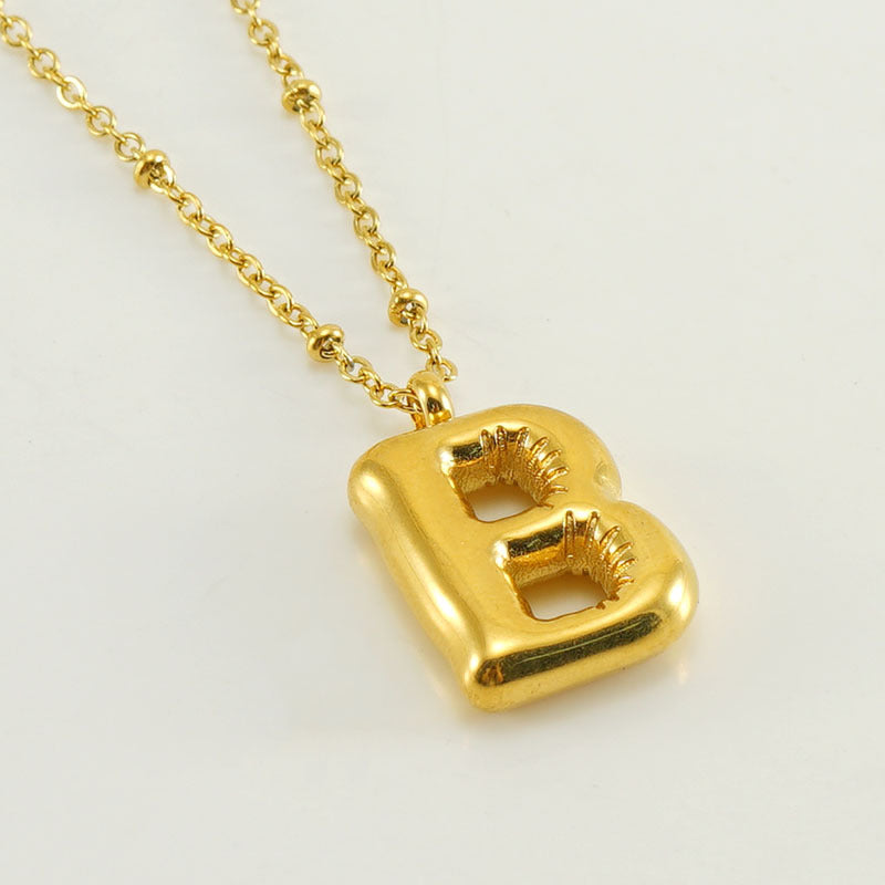 Irena – Gold Initial Charm Necklace