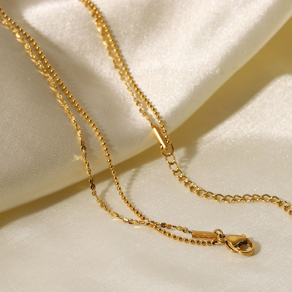 Helena – Elegant Gold Necklace with Subtle Geometric Pendant