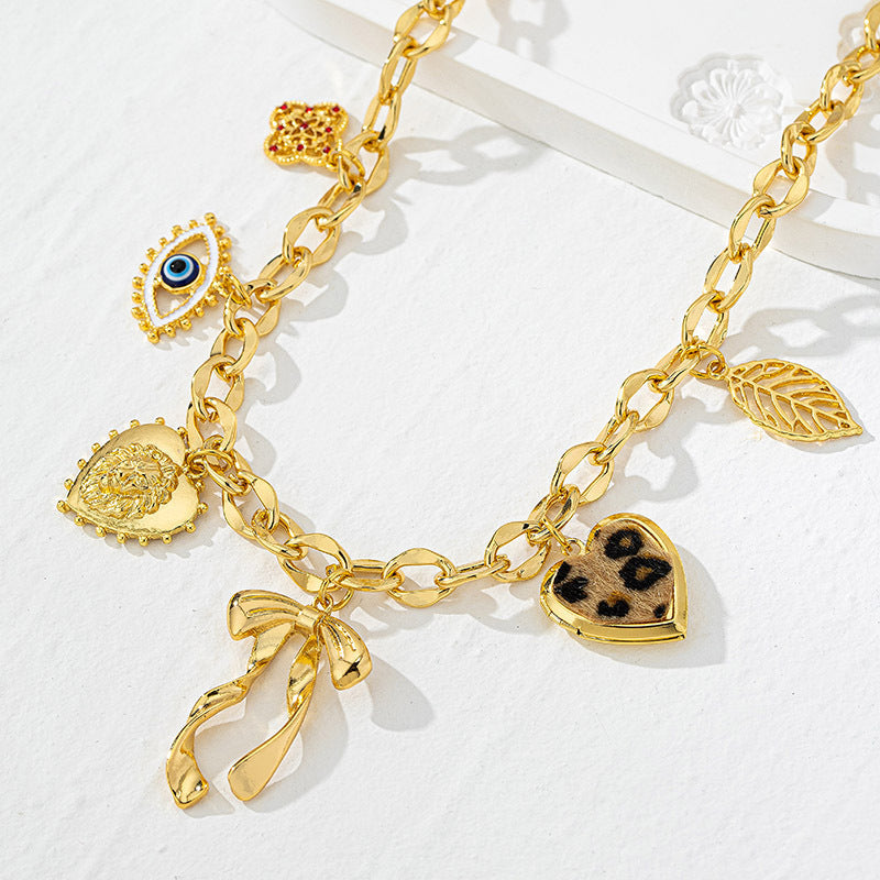 Lena – Gold Necklace Adorned with Stone Accents