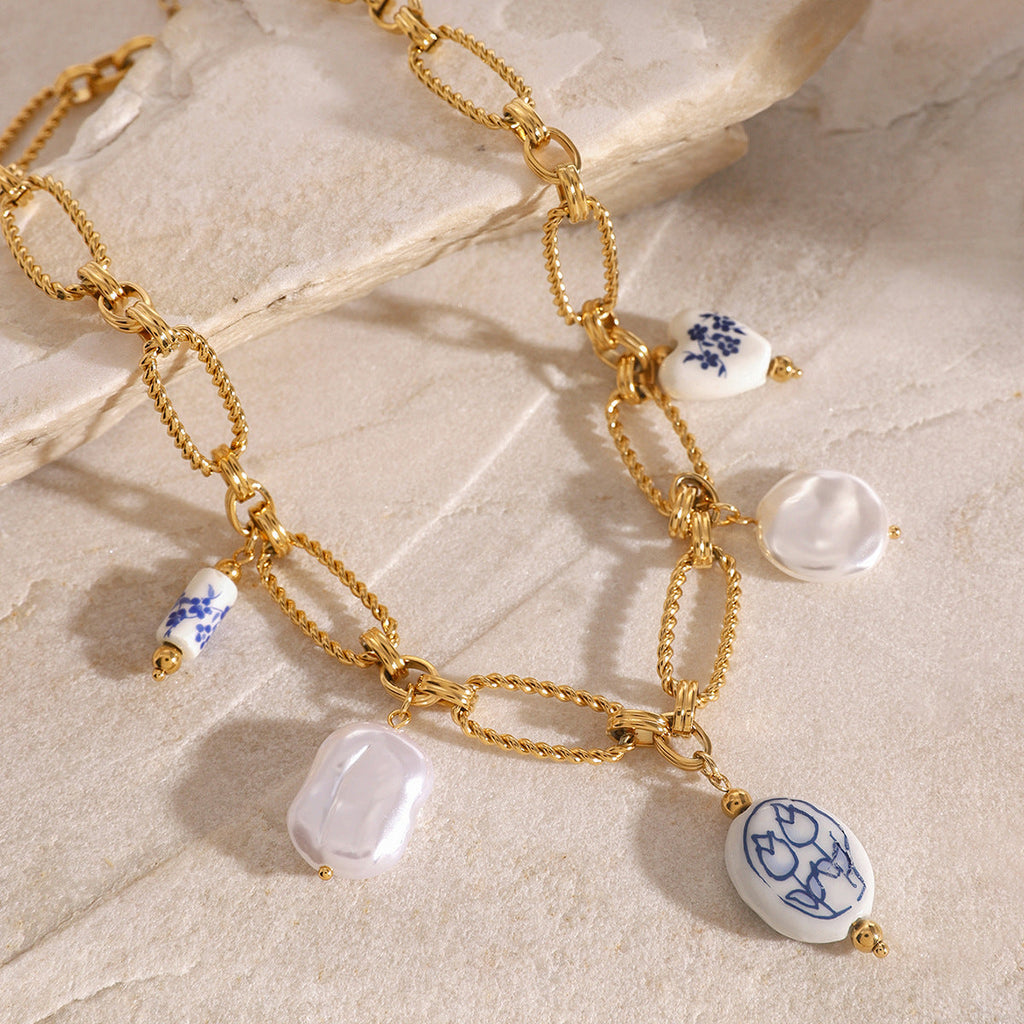 Lena - Gold Necklace Featuring Stone Accents