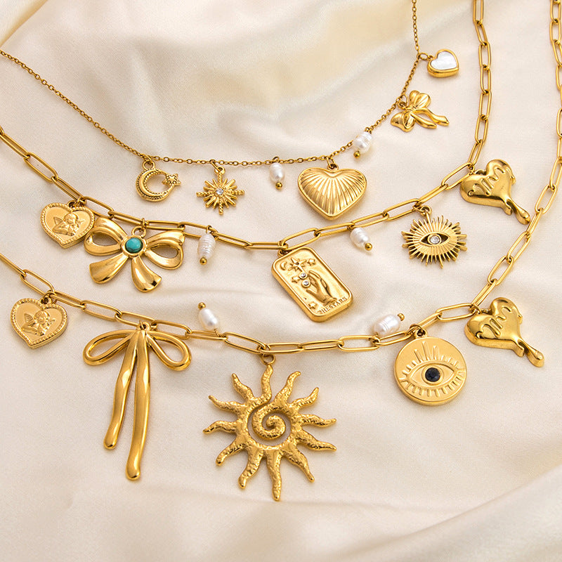 Emilie – Elegant Gold Necklace with Petite Pendants