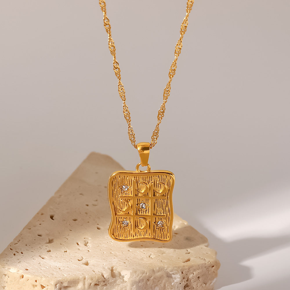 Elisabeth – Gold Necklace Featuring Delicate Symbolic Pendants