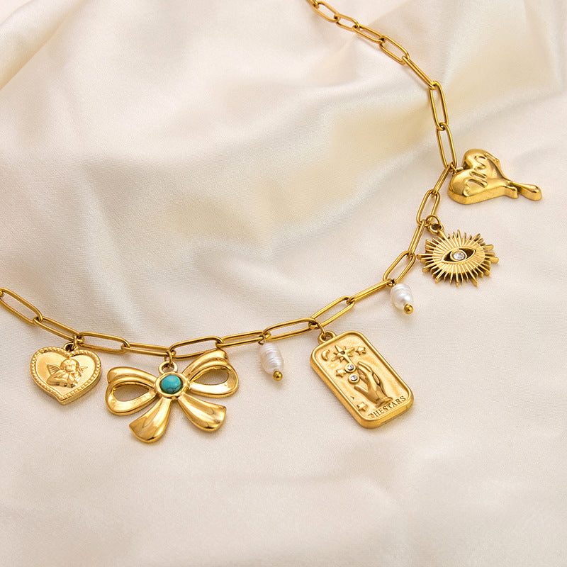 Emilie – Elegant Gold Necklace with Petite Pendants