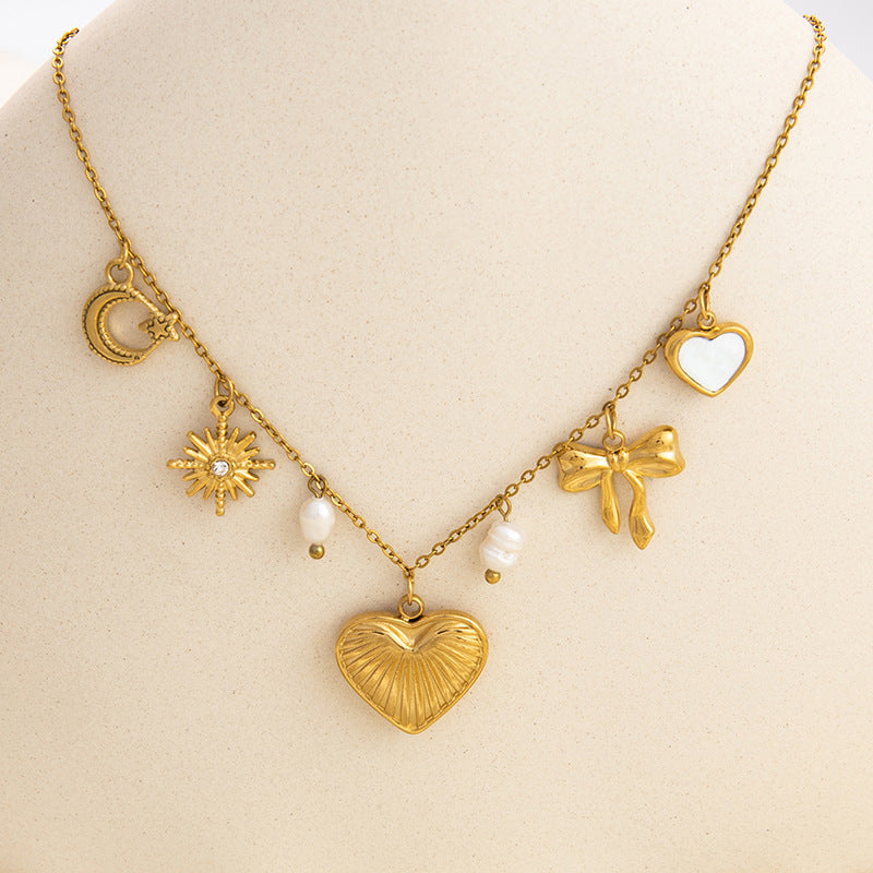 Emilie – Elegant Gold Necklace with Petite Pendants
