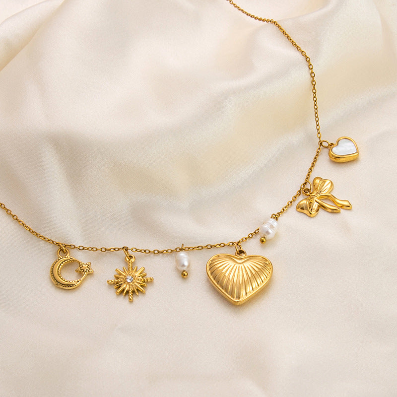 Emilie – Elegant Gold Necklace with Petite Pendants