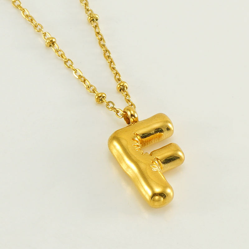 Irena – Gold Initial Charm Necklace