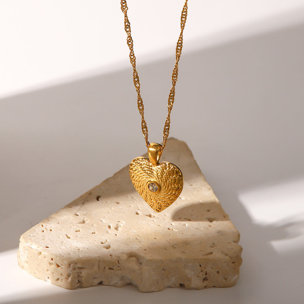 Elisabeth – Gold Necklace Featuring Delicate Symbolic Pendants