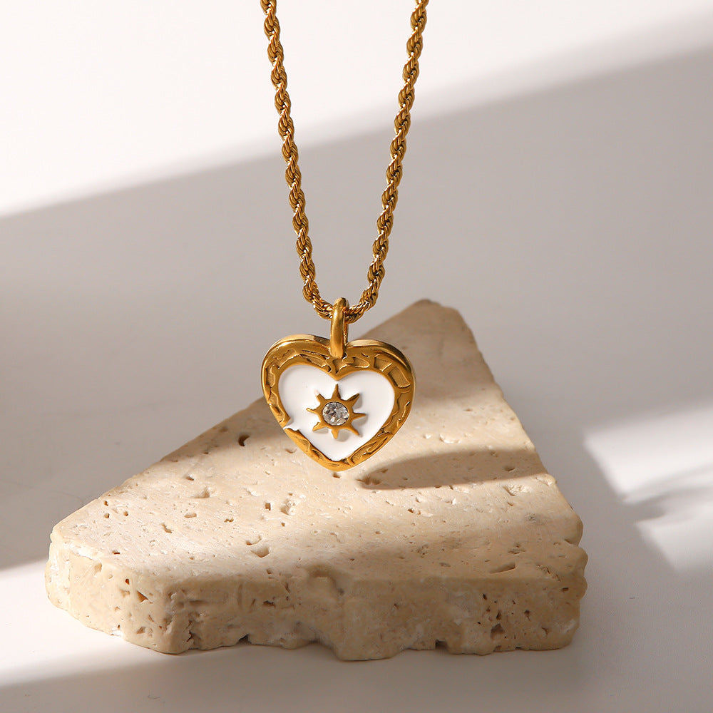 Elisabeth – Gold Necklace Featuring Delicate Symbolic Pendants
