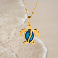 Chantal – Turtle-Shaped Gold Necklace with Blue Opal Accent