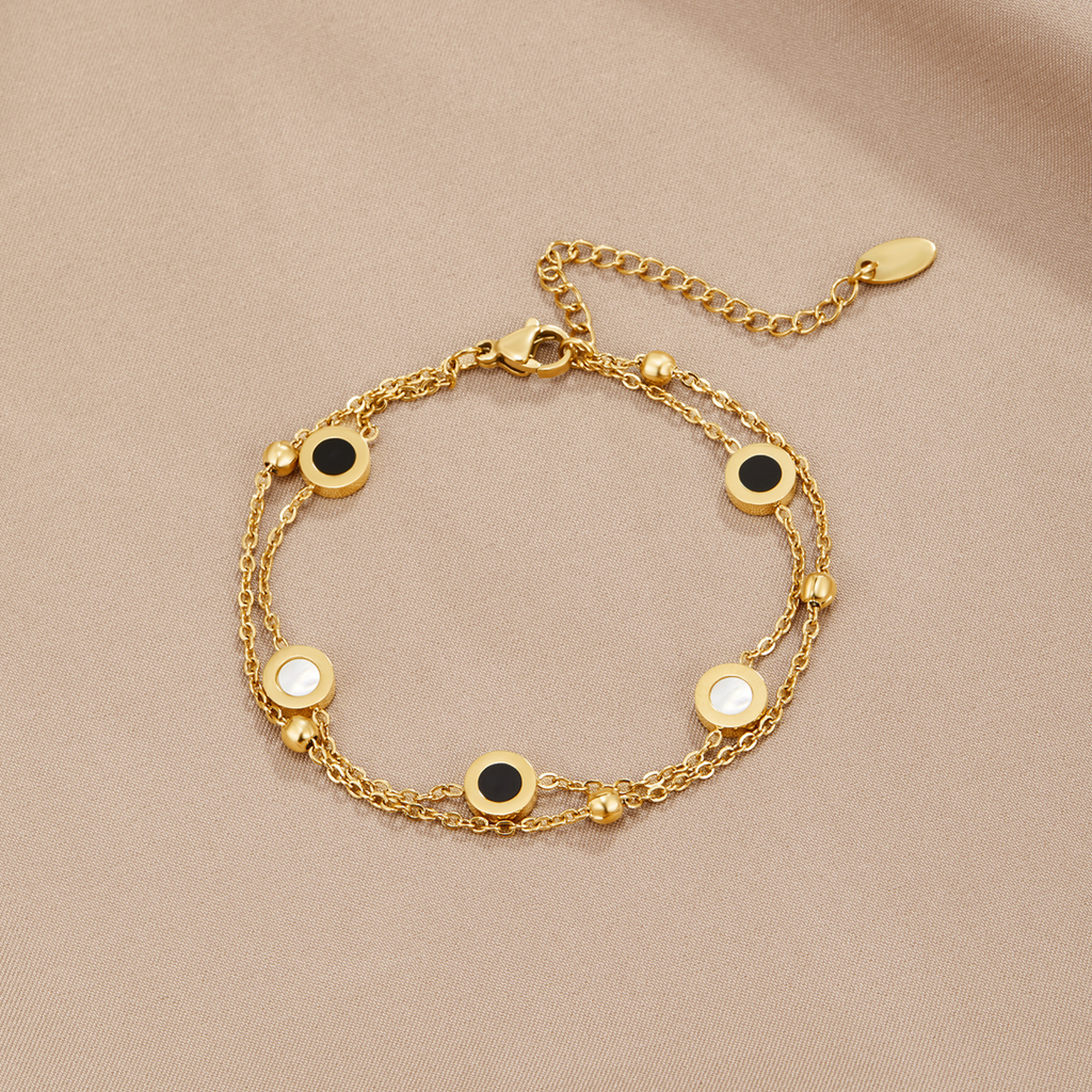 Carla – Elegant Gold Bracelet Featuring Contrasting Round Accents