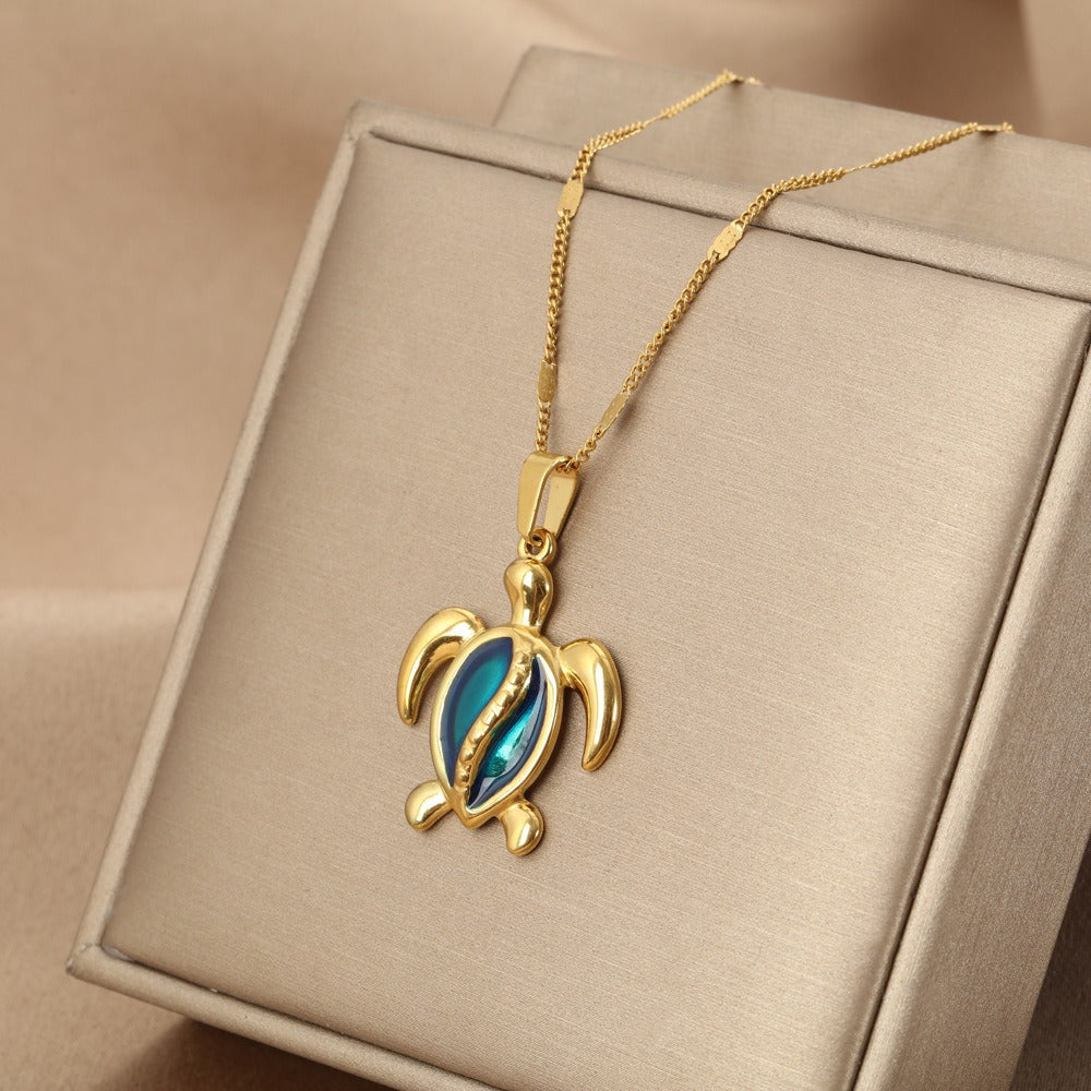 Chantal – Turtle-Shaped Gold Necklace with Blue Opal Accent