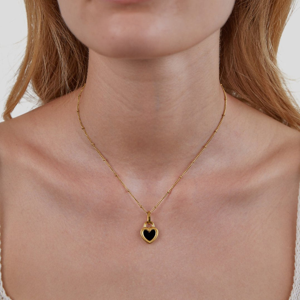 Helga – Gold Necklace Featuring Dual Pendants