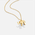 Gisela – Elegant Gold Necklace with Round Pendant and Textured Design