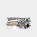 Charming Silver Ring Featuring a Spinning Heart Design