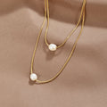Sabina – Gold Double-Layer Necklace Featuring Dark Stone Accent