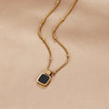 Dorota – Elegant Gold Necklace Featuring a Green Gem