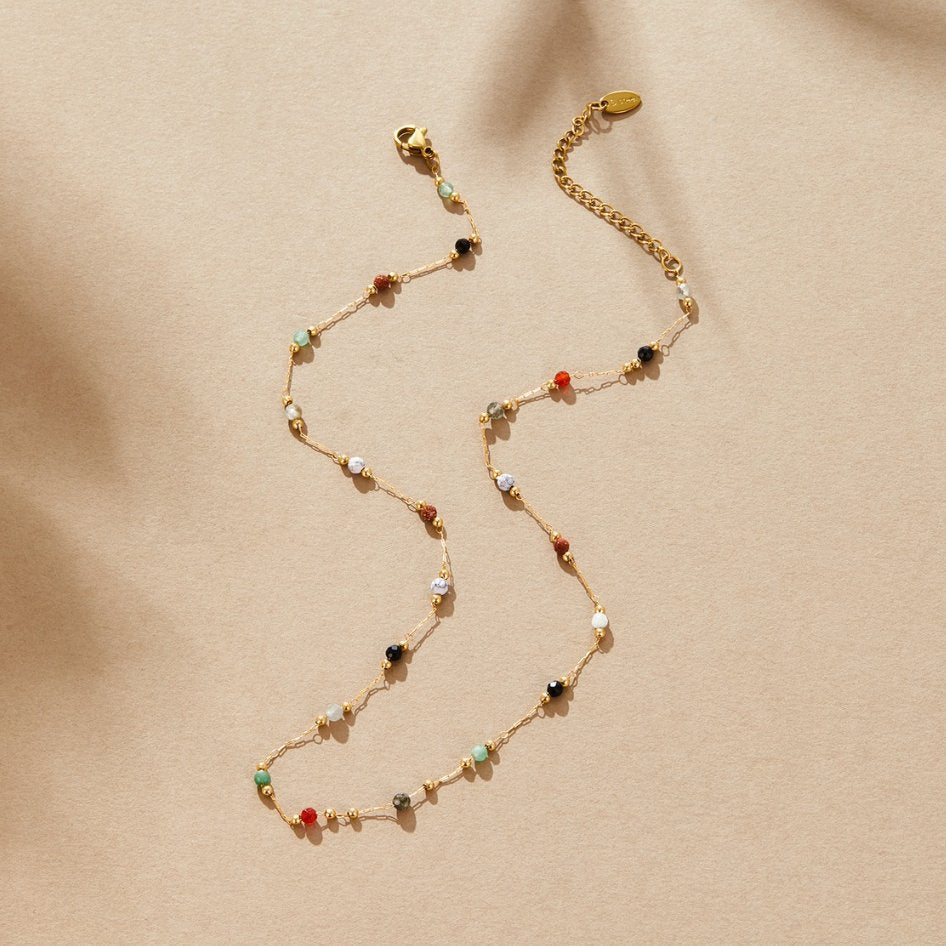 Gertruda – Vibrant Golden Necklace with Colorful Accents