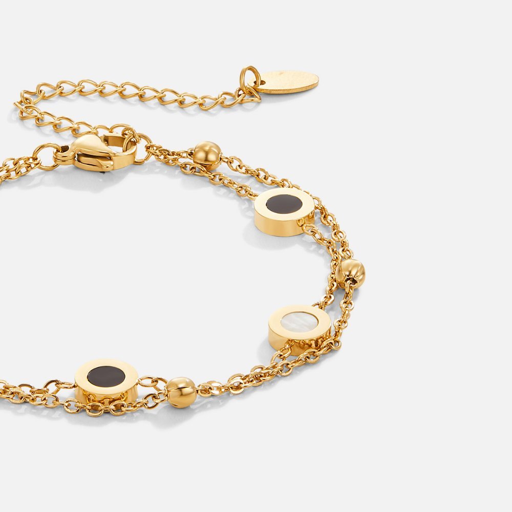 Carla – Elegant Gold Bracelet Featuring Contrasting Round Accents