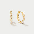 Vale Pearl Hoop Earrings" can be rewritten as "Vale Pearl-Embellished Hoop Earrings.